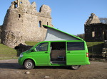 SX12392 Our green VW T5 campervan with popup roof at Ogmore Castle.jpg